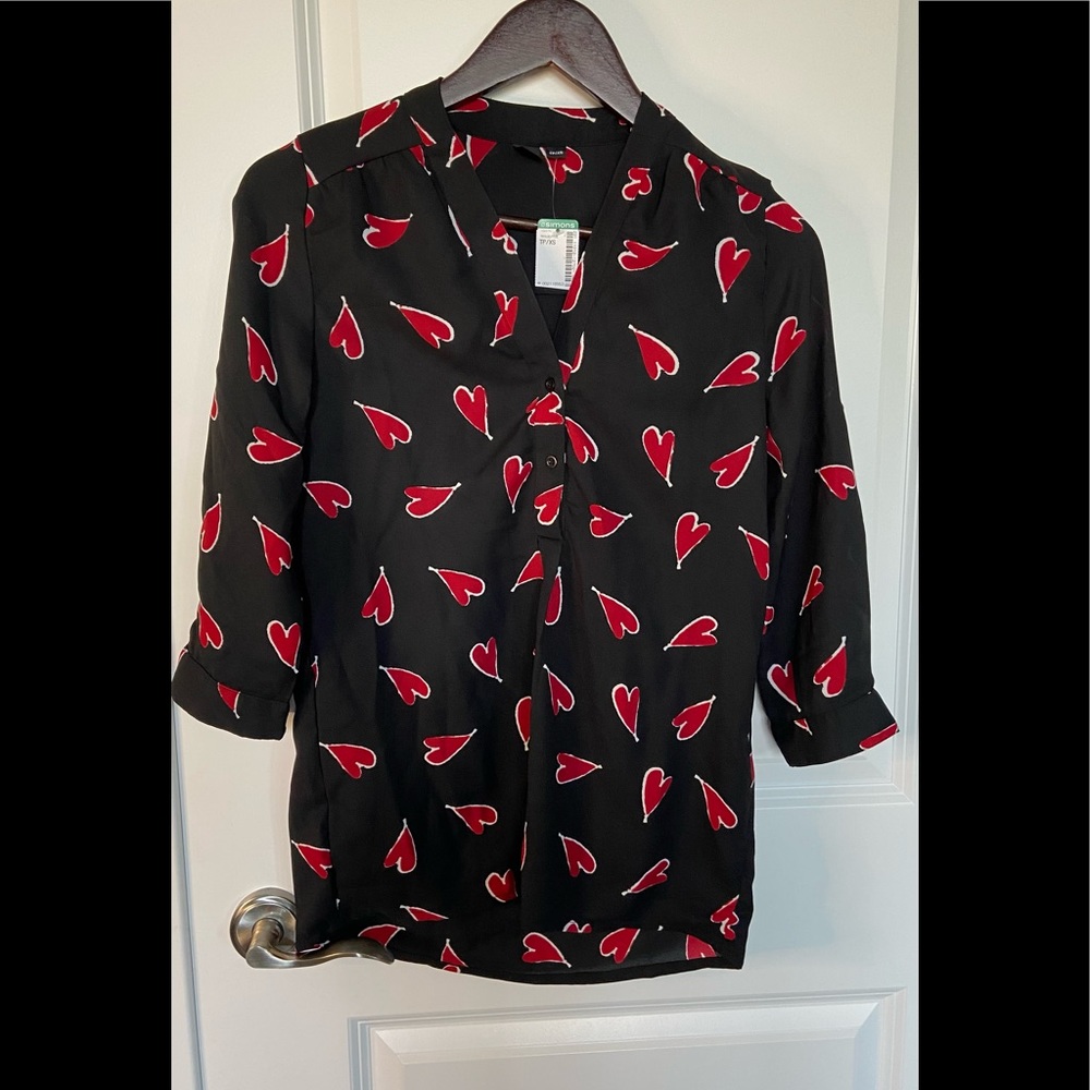 Brand new with tags, Simons Icone size XS. Pretty blouse with hearts.